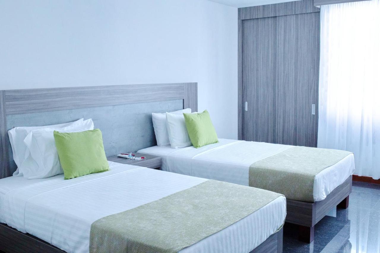 Hotel BE Suites Cali Buitenkant foto